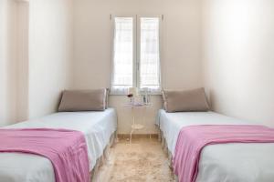 Postel nebo postele na pokoji v ubytování L' angolo di Dora