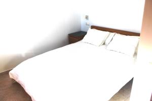 Łóżko lub łóżka w pokoju w obiekcie Relax en primera linea A
