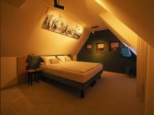 a bedroom with a bed in a room with an attic at Craft Inn - Boutique Hotel in Sibiu