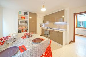 Η κουζίνα ή μικρή κουζίνα στο Cà Square San Marco 425 +3 φωτογραφίες