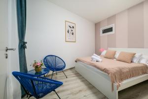 A bed or beds in a room at Raday K203 residence with private balcony