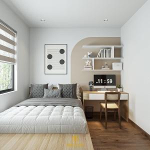 1 dormitorio con cama y escritorio en Bach Dang Apartment Hai Duong en Hải Dương