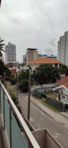 a view of a city street from a balcony at SkyCasa Holiday Apartments in Mount Lavinia