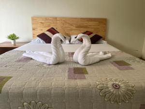 Postel nebo postele na pokoji v ubytování Chat Residence Hotel
