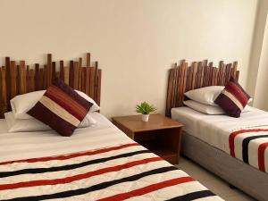 Postel nebo postele na pokoji v ubytování Chat Residence Hotel