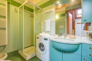 Koupelna v ubytování La Torre In The Center Of Town - Happy Rentals + 19 fotografií