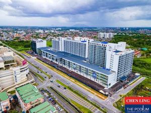 an aerial view of a city with buildings at The Podium Studio@Amy*Home in Kuching