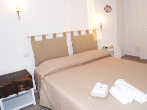 Postel nebo postele na pokoji v ubytování B&B More Than Rome