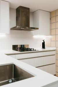Kuchyň nebo kuchyňský kout v ubytování Hauzify I Apartament Arroyo + 12 fotografií