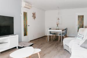 TV a/nebo společenská místnost v ubytování Hauzify I Apartament Arroyo