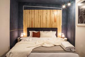 Postel nebo postele na pokoji v ubytování Nisa Kub Residence