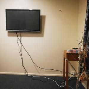 TV a/nebo společenská místnost v ubytování Bluewater Lodge