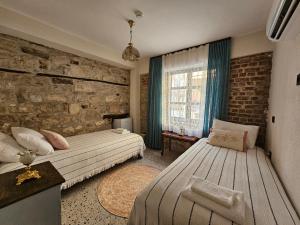 A bed or beds in a room at Origin Suites Urla