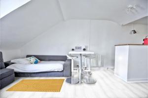 a room with a bed and a table and a kitchen at Promo! near The Pantheon - Latin Quarter! in Paris