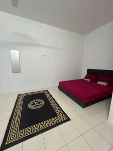 Una cama o camas en una habitación de Az-zahra Home Stay Kulim Hi-Tech 2 fotos más