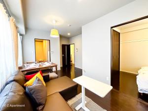 Letto o letti in una camera di Z Apart ment 大阪通天閣玩具街旅居