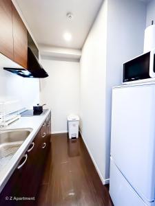 Cucina o angolo cottura di Z Apart ment 大阪通天閣玩具街旅居