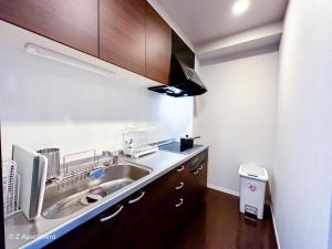 Cucina o angolo cottura di Z Apart ment 大阪通天閣玩具街旅居