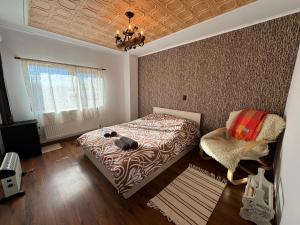 Postel nebo postele na pokoji v ubytování “Хаджи-Ваньовата” къща