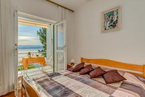 Postel nebo postele na pokoji v ubytování VILLA LEON***