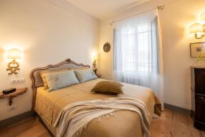 Ένα ή περισσότερα κρεβάτια σε δωμάτιο στο Albergo Le Terme