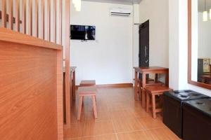 TV a/nebo společenská místnost v ubytování Aryani Suites Syariah