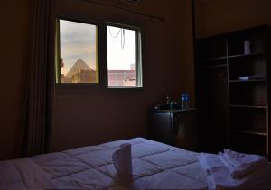Letto o letti in una camera di King Badr pyramids
