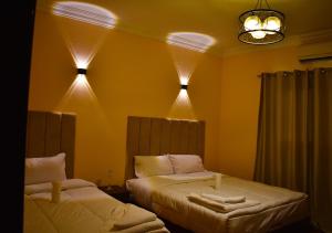 Letto o letti in una camera di King Badr pyramids