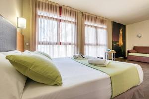 Postel nebo postele na pokoji v ubytování Hotel Pere III El Gran