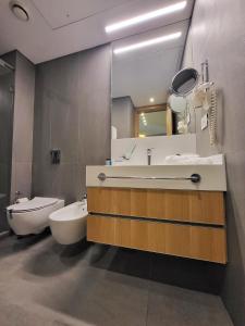 Vannituba majutusasutuses Monot Suites