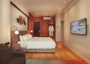 Postel nebo postele na pokoji v ubytování FUHOTEL