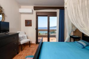 Posteľ alebo postele v izbe v ubytovaní Vue Sur la Mer