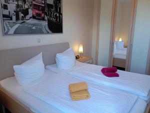 Tempat tidur dalam kamar di Luxuriöse Wohnung Villa Royal Whg 1 - b49106