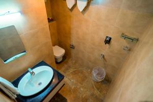 Vannituba majutusasutuses Trivers Resort Munnar