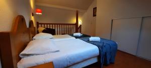 Posteľ alebo postele v izbe v ubytovaní Duplex-Chalet entre Lac et Montagne avec Balcon + 28 fotografií