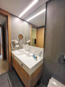 Vannituba majutusasutuses Monot Suites