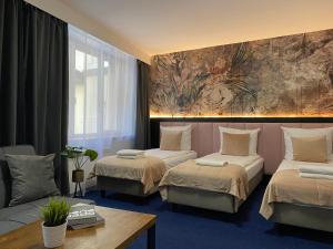 Posteľ alebo postele v izbe v ubytovaní Garbarska 22 Aparthotel