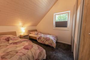 Postel nebo postele na pokoji v ubytování Luv - Nordhorn