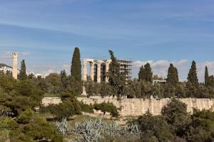 a view of the acropolis of athens from the acropolis at Acropolis Grand Suite in Athens