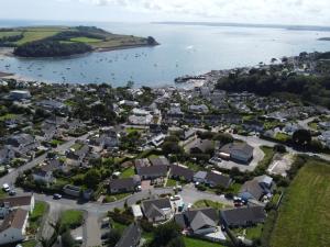 an aerial view of a town next to a body of water at Willow in Saint Mawes