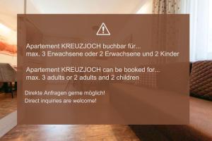 a sign on a wall in a room at Pension Gletscherblick in Fulpmes +92 photos