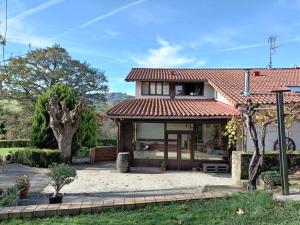 a house with a red roof at Eguzkitza in Rentería