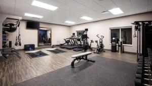 a gym with several treadmills and exercise bikes at Hampton Inn Green Bay Stadium, Wi in Green Bay