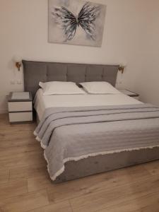 Posteľ alebo postele v izbe v ubytovaní Apartments Proto