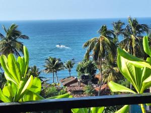 a view of the ocean from the balcony of a resort at Marino Mirissa in Mirissa