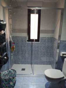Ett badrum på VUT Casa Miranda 51