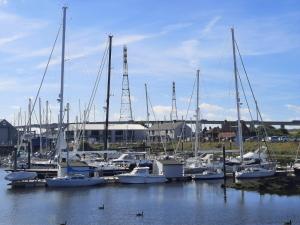 a bunch of boats docked in a harbor at Modern 3 Bedroom Town House in Ipswich in Ipswich