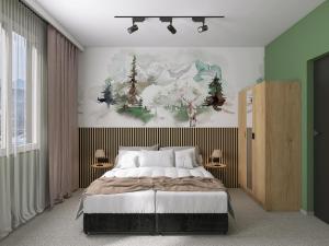 a bedroom with a large bed and a painting on the wall at Hotel Etropol, Center Etropole in Etropole