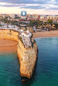 an aerial view of a beach and a cliff at Linda Vista Mar T1, A-C, Wi-Fi, Porches in Porches