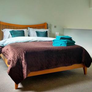 Ένα ή περισσότερα κρεβάτια σε δωμάτιο στο Maple Gardens Studio